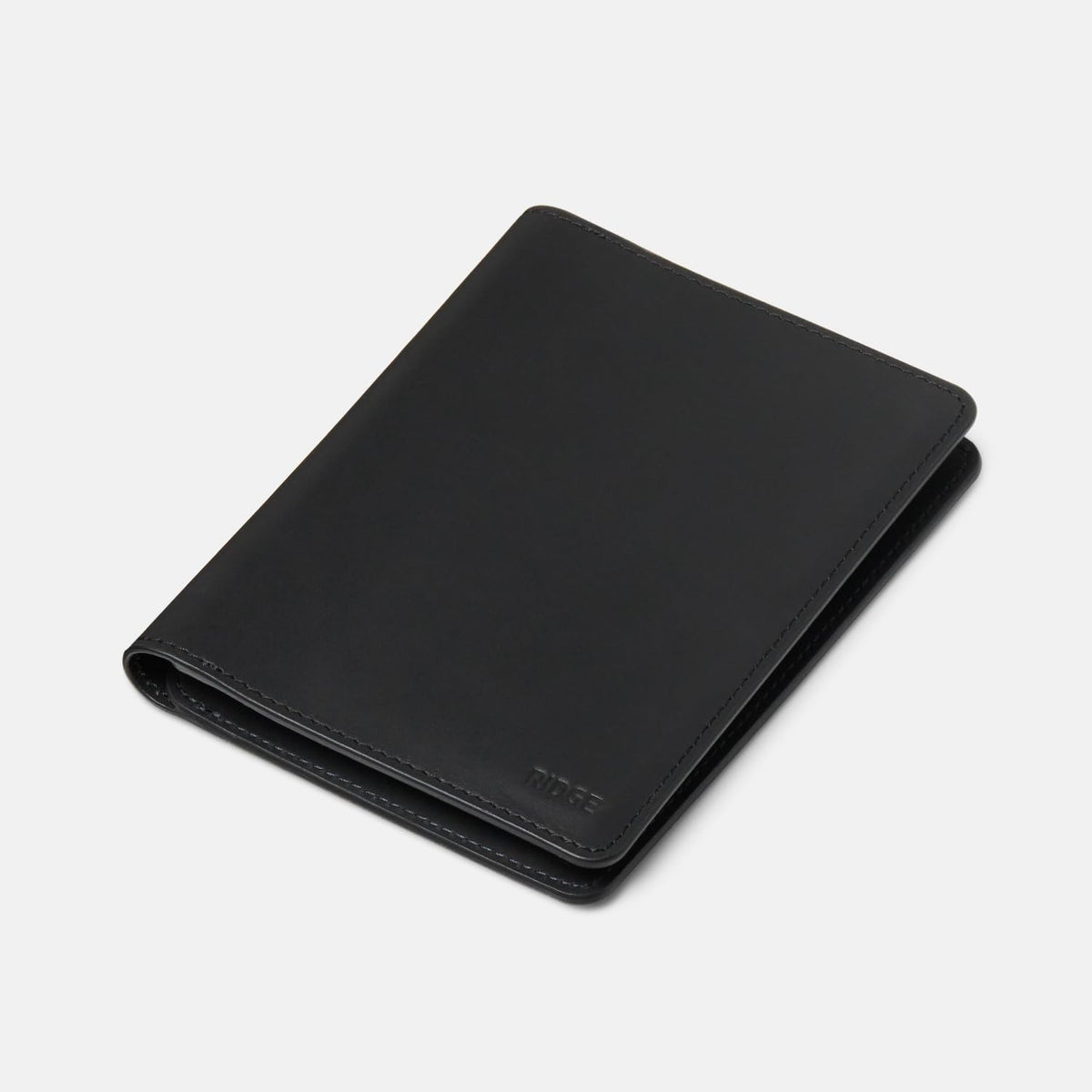Ridge Passport Holder - Leather Travel Wallet, RFID Protection, Holds Passport, 6 Credit Cards, Folded Cash, And a Boarding Pass (Midnight Black)