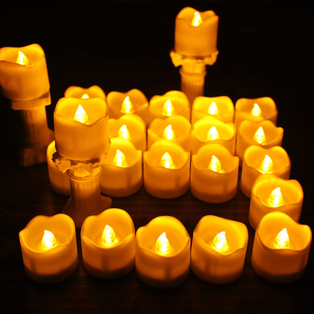 Wilrigir Flameless Votive Candles with Remote Control,CR2450 Battery Operated Tea Light with Timer,Warm Yellow LED Candles for Christmas,Halloween,Home Decoration,Pack of 12