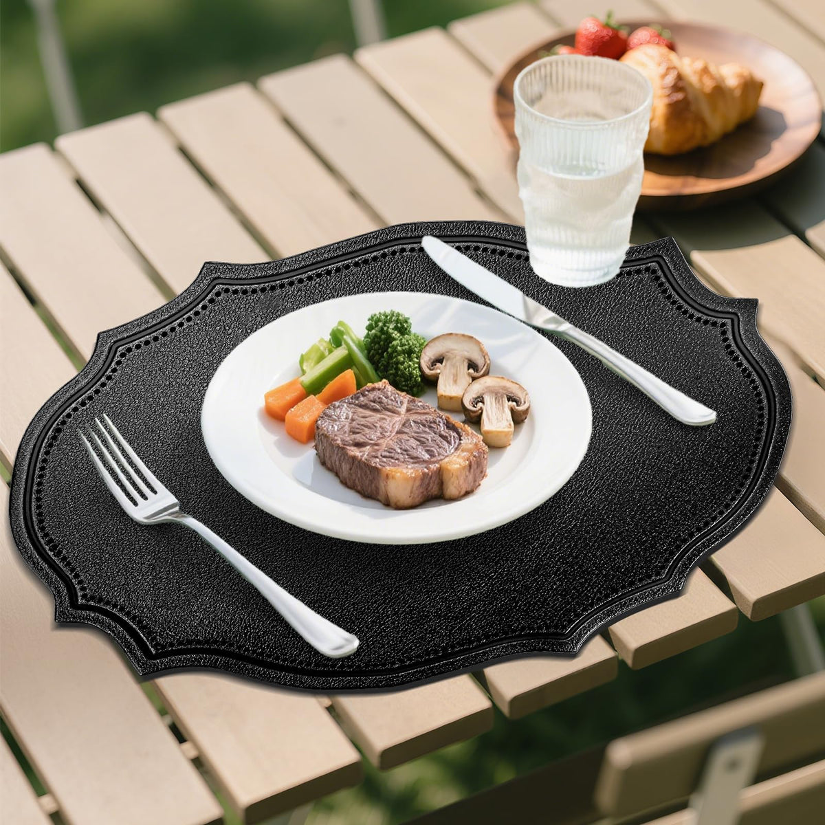 fanquare Faux Leather Placemats Set of 6,Oval Heat-Resistant Wipeable Surface Tablemats, Non-Slip Grip, Waterproof Table Décor for Dining, Black