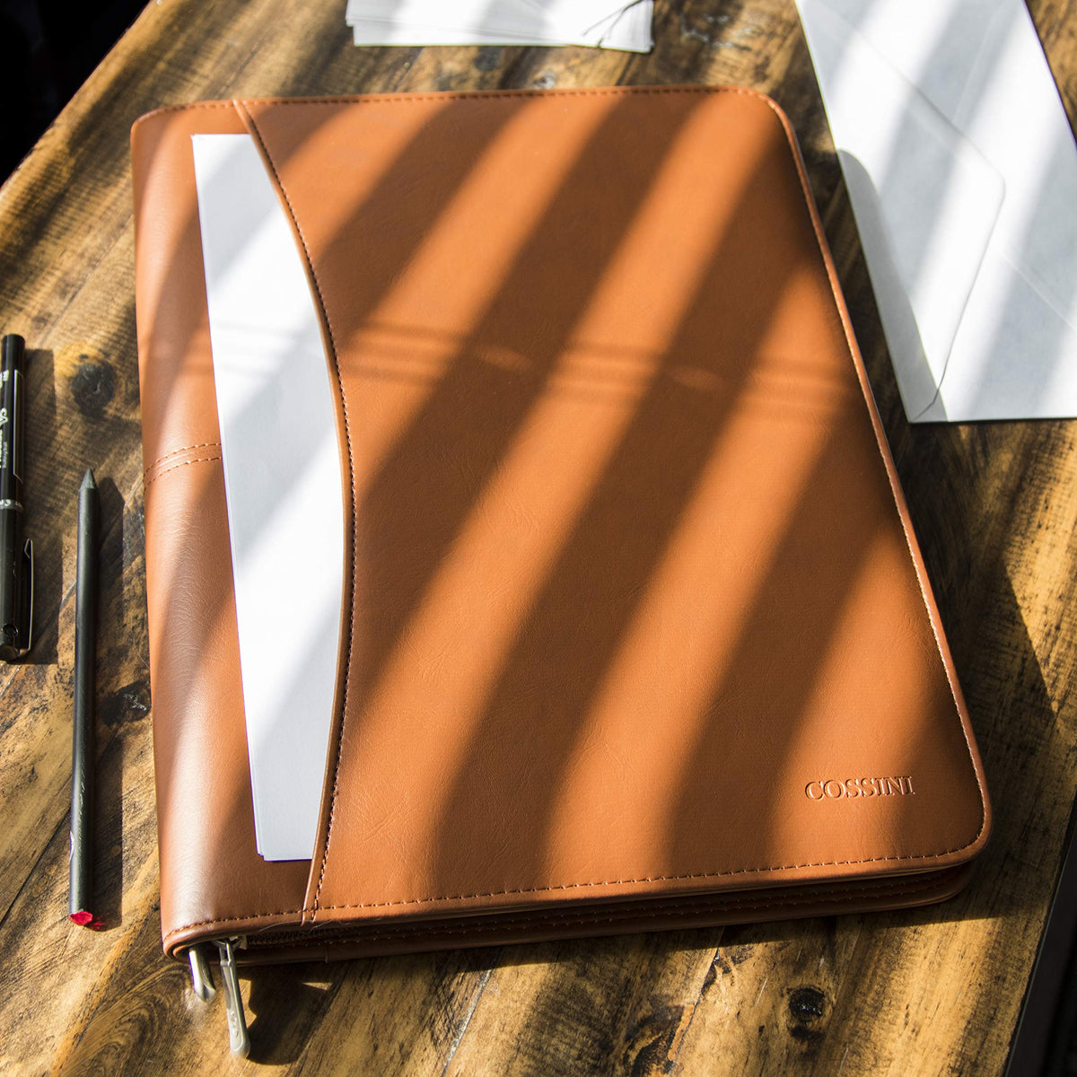 Cossini Premium Business Portfolio with Zipper – Padfolio - Superior Business Impressions Begin with PU Vegan Leather, 10.1 Inch Tablet Sleeve, Smart Storage, Solar Calculator, Writing Pad - Tan