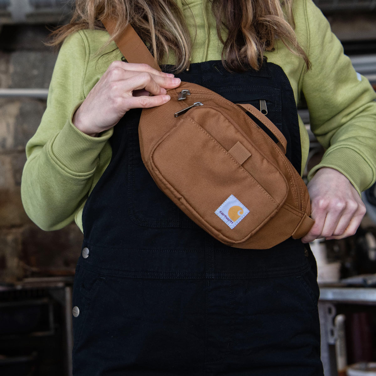 Carhartt Classic Adjustable Sling Bag, Durable, 600-Denier Water Resistant Hip Pack, Essential Waist Pack (Carhartt Brown)